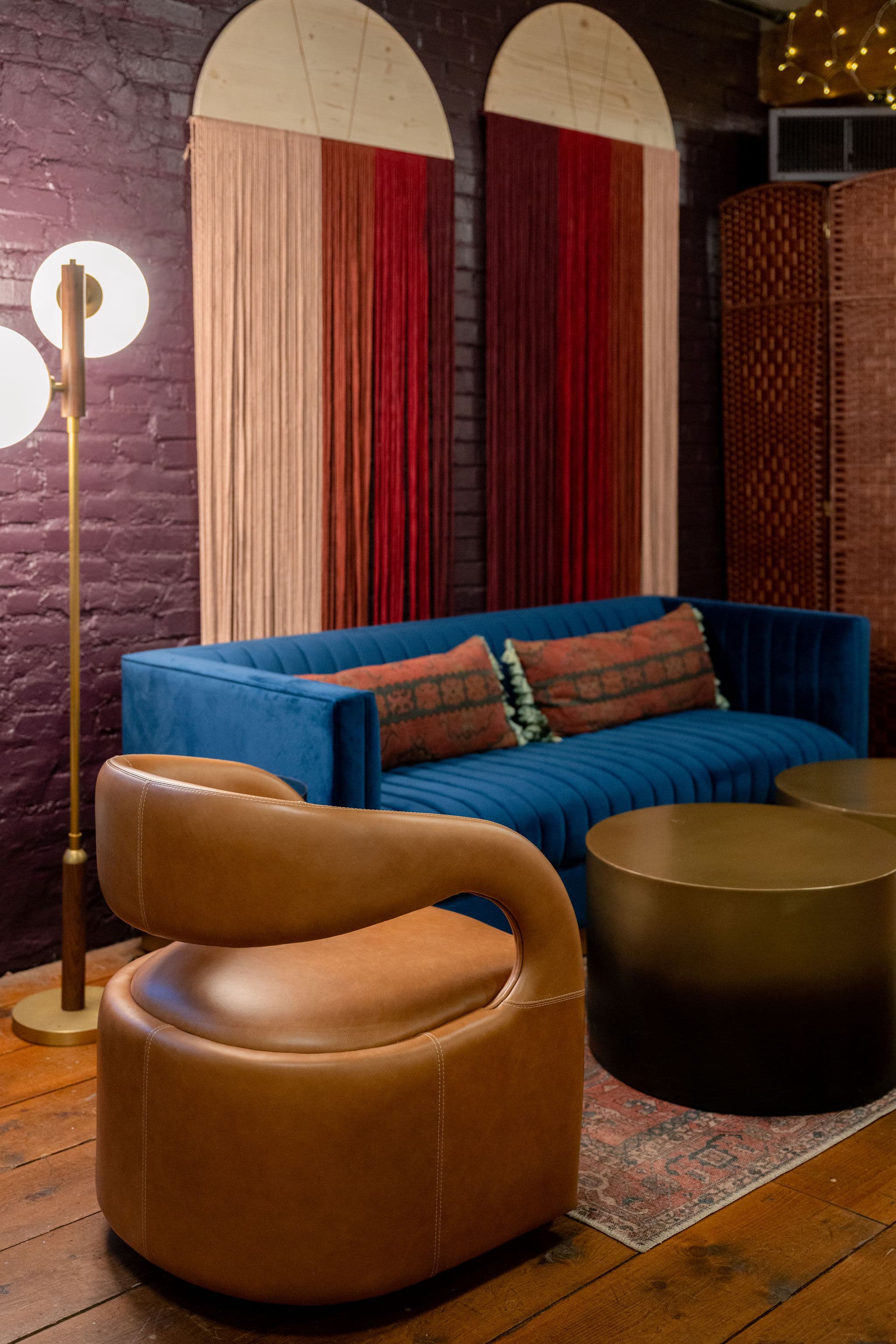 Blue velvet sofa lounge area